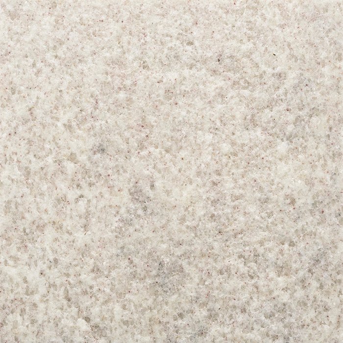 granito-kashmir-white Granito Kashmir White de piedra natural en tonos blanco, crema y gris claro, ideal para mesadas, revestimientos, islas de cocina y proyectos de arquitectura e interiorismo.