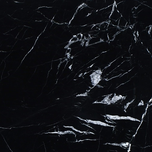 marmol-negro-marquina Mármol Negro Marquina natural de fondo negro intenso con vetas blancas irregulares, ideal para revestimientos, mesadas de baño y proyectos de interiorismo de alta gama.