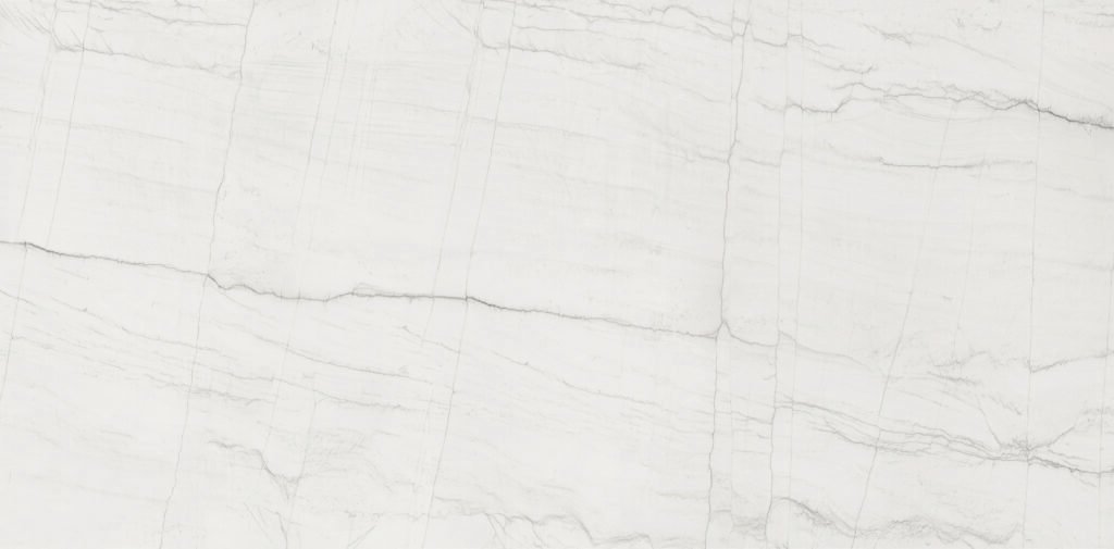 BLANC Neolith Mont Blanc, piedra sinterizada de fondo blanco con sutiles vetas grises, negras y ocres, ideal para mesadas y revestimientos.