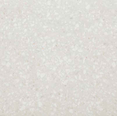 Neolith Retrostone, piedra sinterizada de fondo claro con efecto de grano inspirado en el terrazo tradicional, ideal para mesadas y revestimientos.