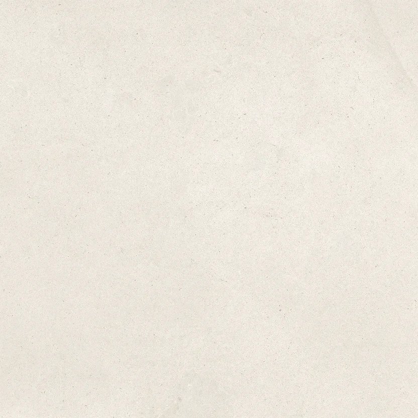 Purastone Prima Limestone, superficie sinterizada beige claro inspirada en la piedra caliza natural, ideal para mesadas, islas y revestimientos.