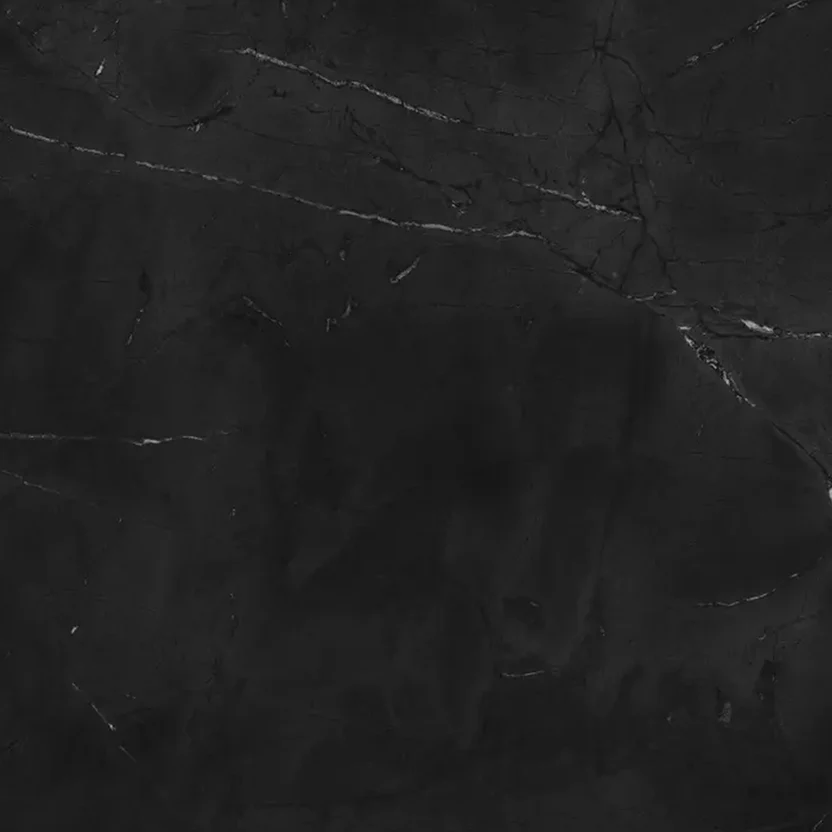 purastone-prima-negresco Purastone Prima Negresco, superficie sinterizada de fondo negro profundo con vetas claras y plateadas, ideal para mesadas, islas, revestimientos y proyectos de interior y exterior.