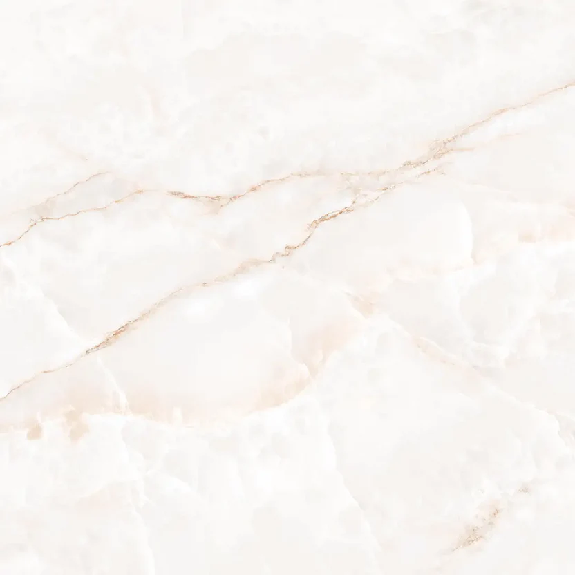 purastone-prima-onyx-white Purastone Prima Onyx White, superficie sinterizada de fondo blanco cálido con suaves vetas doradas y matices crema, ideal para mesadas, islas y revestimientos.