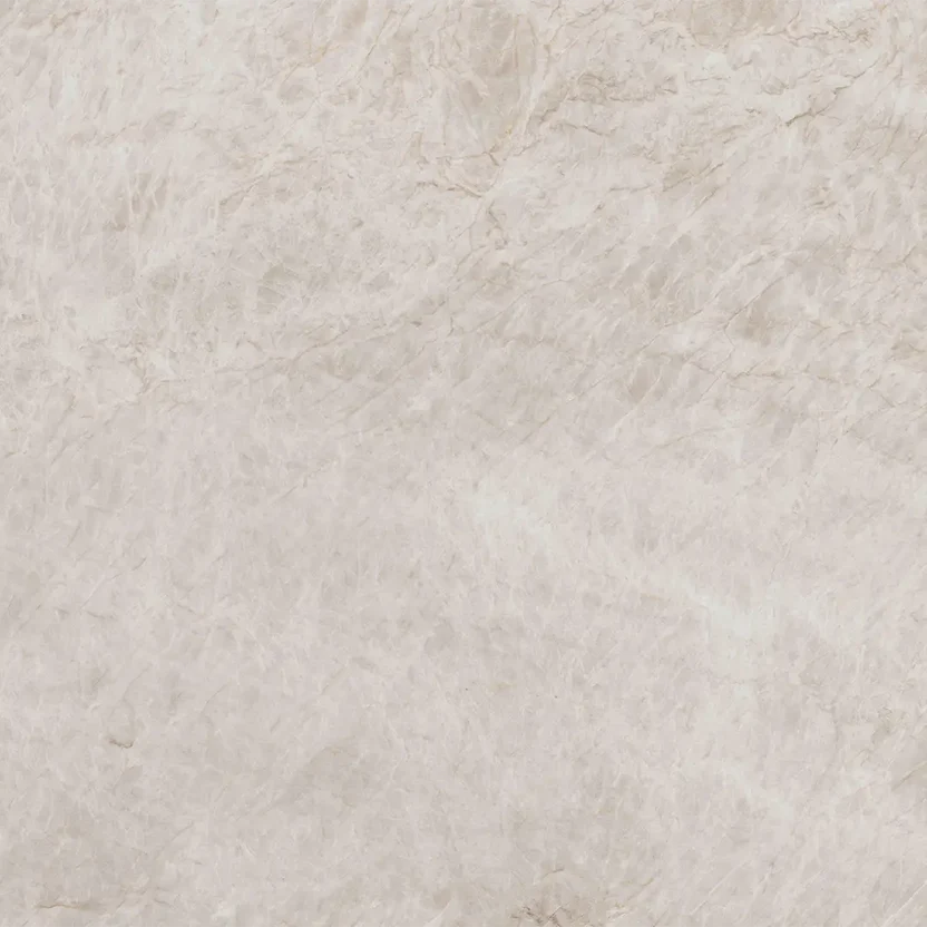 Purastone Prima Taj Mahal, superficie sinterizada en tonos crema y beige inspirada en la cuarcita natural, ideal para mesadas, islas y revestimientos.